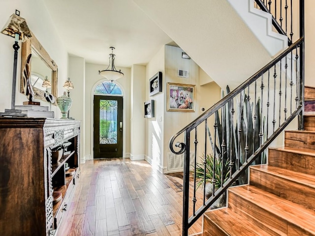 entrance foyer featuring hardwood / wood-style floors