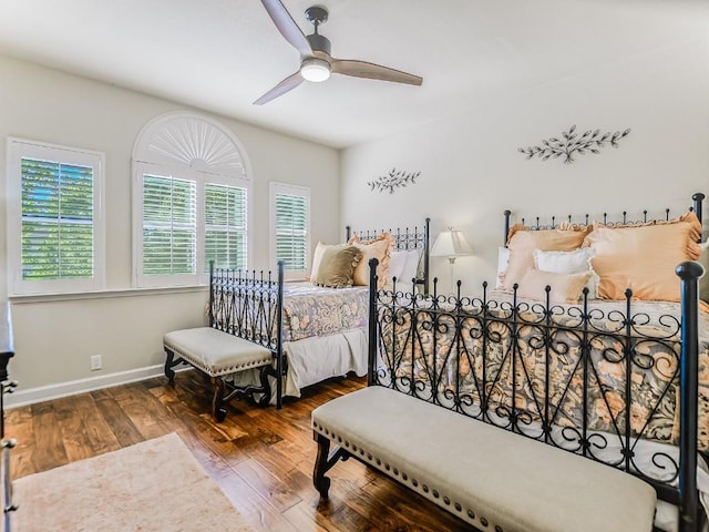 bedroom featuring hardwood / wood-style flooring and ceiling fan