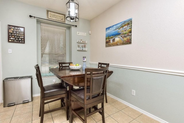 dining area featuring light tile patterned floors