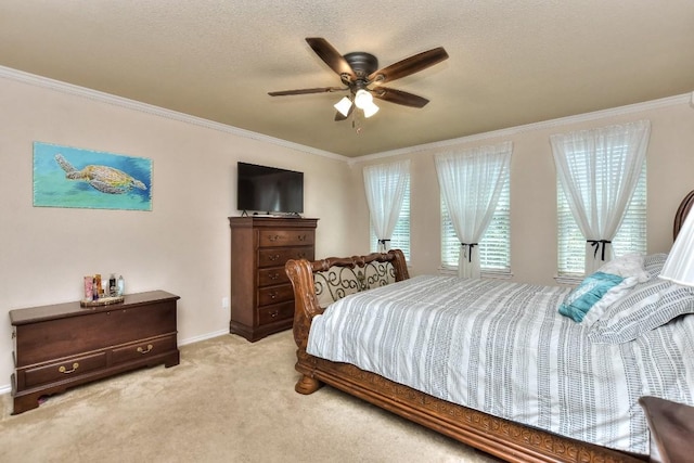 bedroom featuring ornamental molding, light colored carpet, and a textured ceiling