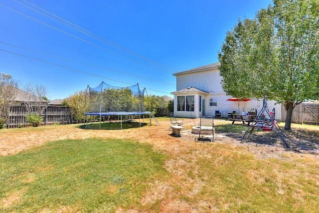 view of yard with a trampoline