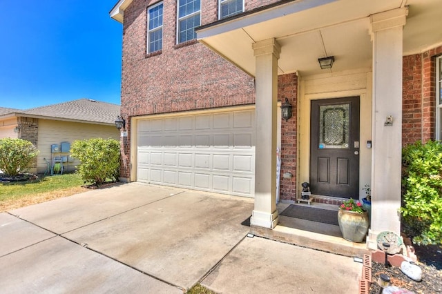 doorway to property featuring a garage