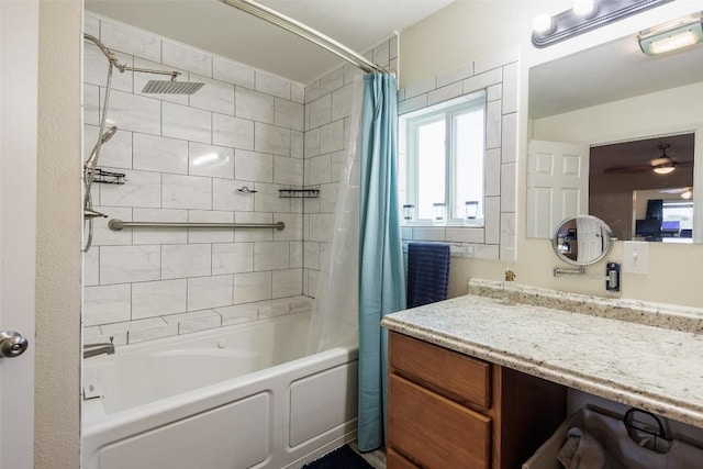 bathroom with ceiling fan, vanity, and shower / bath combo with shower curtain