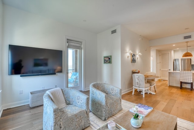 living room with hardwood / wood-style flooring