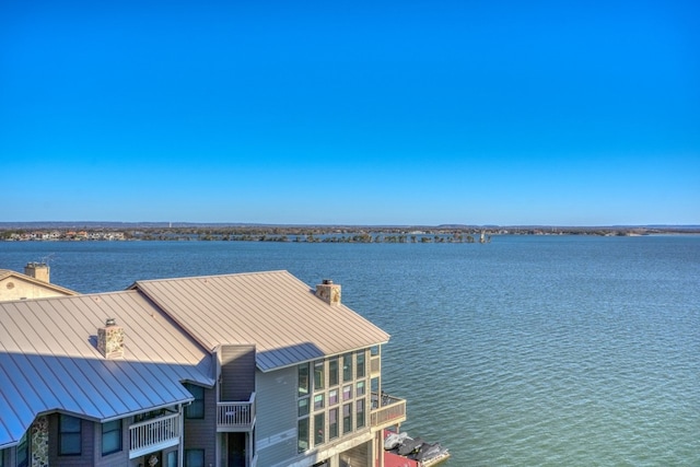 dock area with a water view