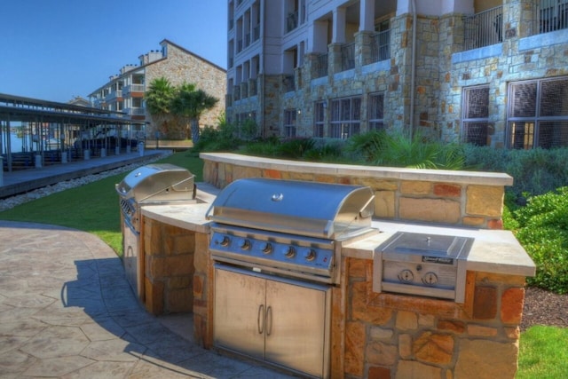 view of patio with area for grilling and grilling area