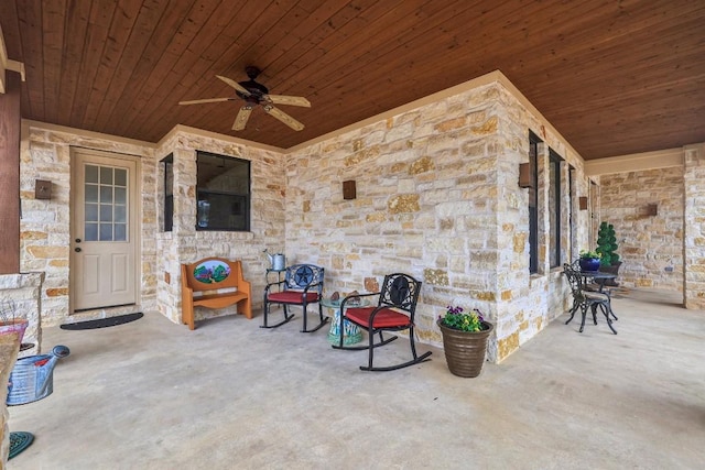 view of patio featuring a ceiling fan