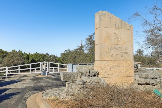 exterior space with a gate and fence