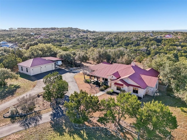 view from above of property featuring a forest