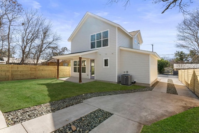 512 W Saint Johns Ave Unit A, Austin, TX 78752 - rear view of house featuring a patio area and central air condition unit
