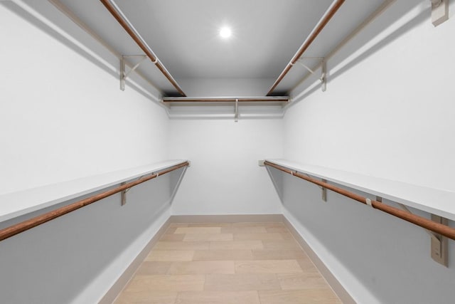 512 W Saint Johns Ave Unit A, Austin, TX 78752 - walk in closet featuring light wood-style floors