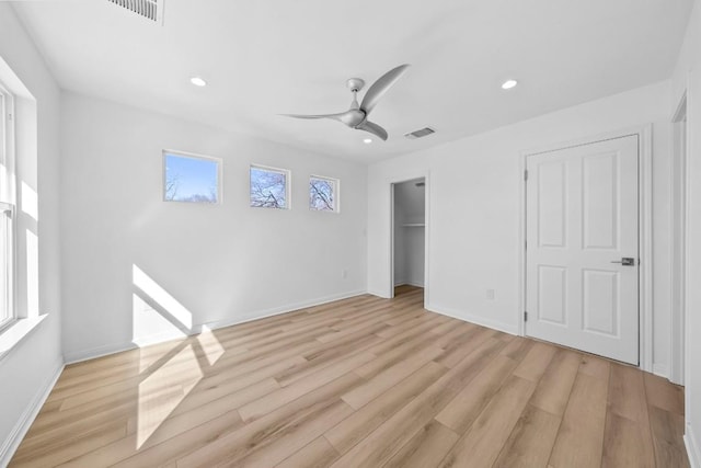 unfurnished bedroom with visible vents, baseboards, light wood-type flooring, recessed lighting, and a ceiling fan