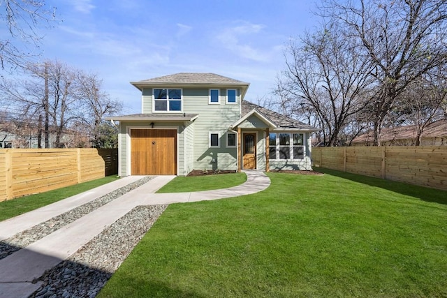 view of front of property with fence private yard, a front yard, and a sunroom