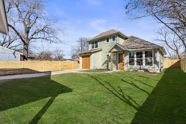 exterior space with a fenced backyard