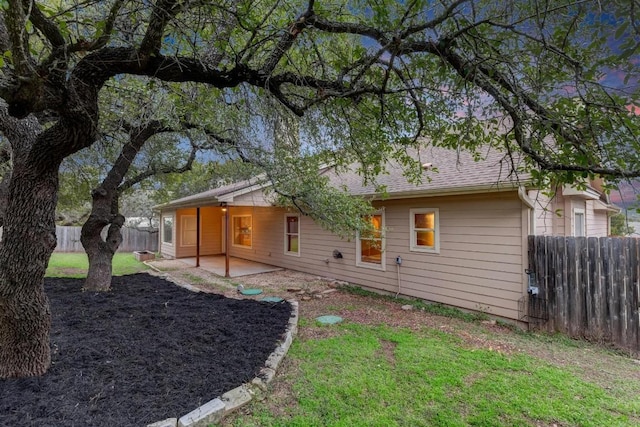 rear view of house with a patio area