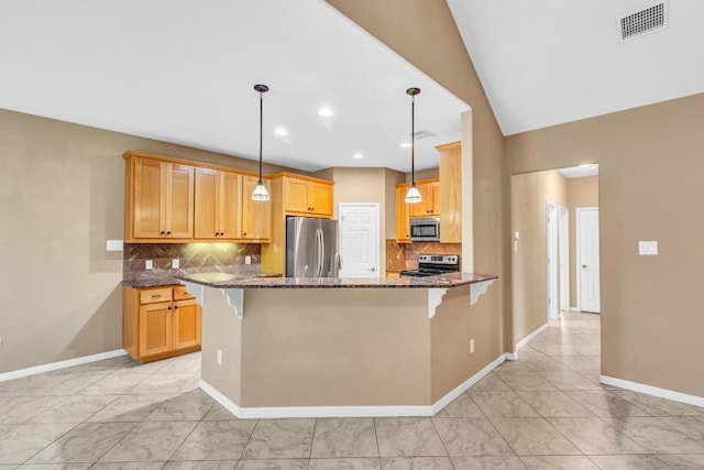 205 Errol Dr, Spicewood, TX 78669 - kitchen featuring stainless steel appliances, dark stone countertops, baseboards, a peninsula, and recessed lighting
