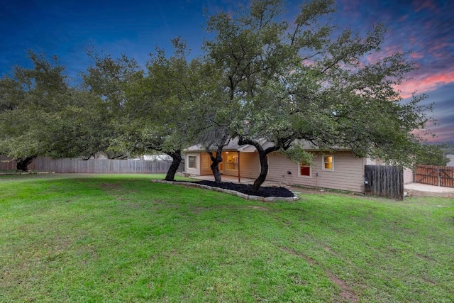 205 Errol Dr, Spicewood, TX 78669 - view of yard at dusk
