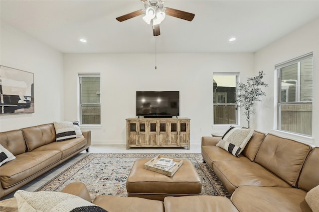 living room featuring ceiling fan