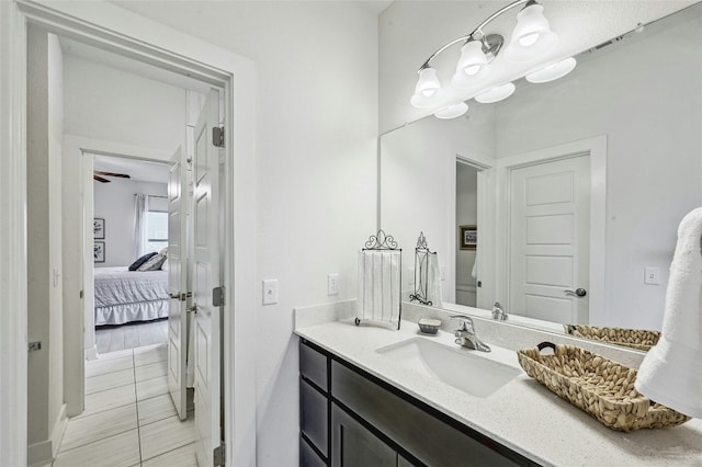 bathroom with vanity and tile patterned floors