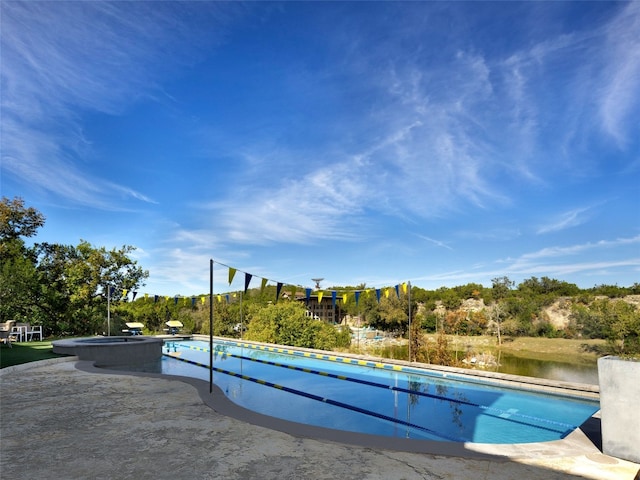 608 Crystal Creek Dr, Austin, TX 78746 - swimming pool with a patio