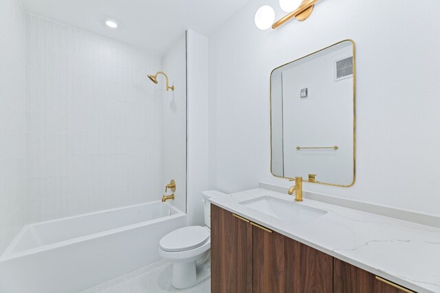 1701 Simond Ave Unit 546, Austin, TX 78723 - full bathroom featuring vanity, toilet, and washtub / shower combination
