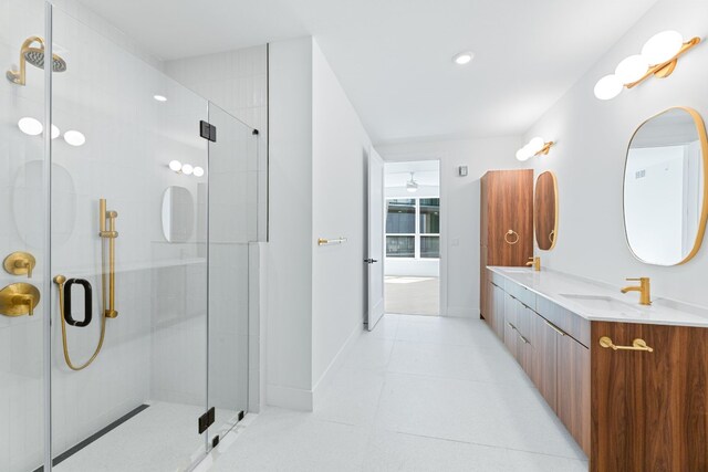1701 Simond Ave Unit 546, Austin, TX 78723 - full bath with double vanity, a shower stall, tile patterned floors, and recessed lighting