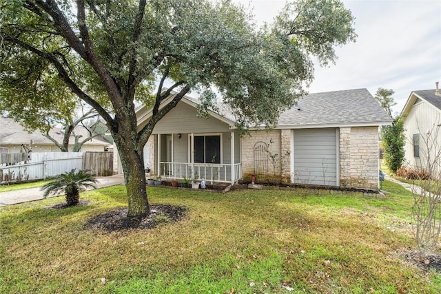 single story home featuring a front lawn and a porch