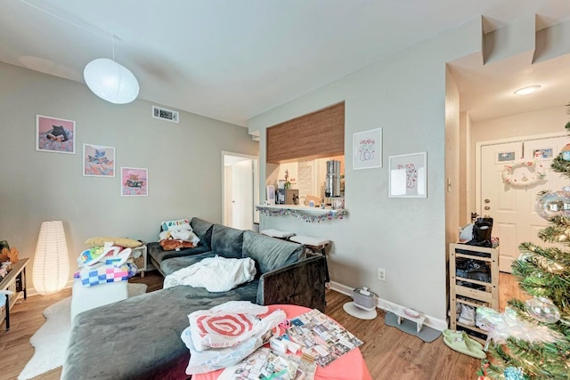 living room with hardwood / wood-style floors