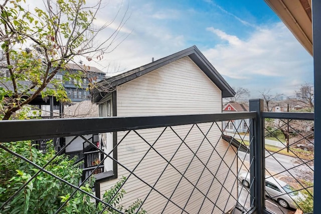 view of property exterior with a balcony