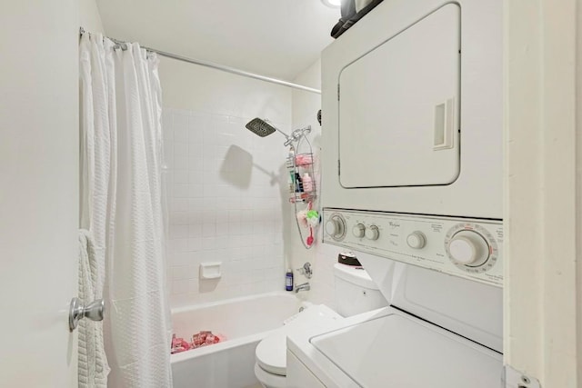 laundry area with stacked washer and clothes dryer