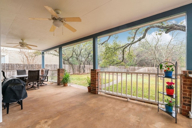 view of patio featuring a grill and ceiling fan