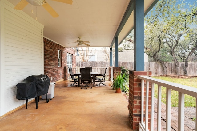 view of patio / terrace featuring a grill and ceiling fan