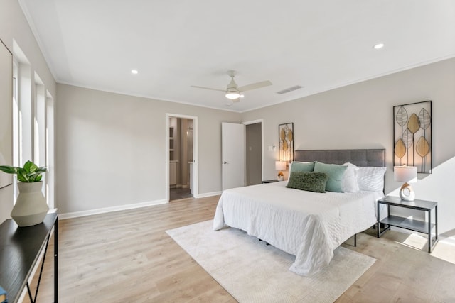 bedroom featuring recessed lighting, visible vents, baseboards, ornamental molding, and light wood-type flooring