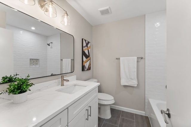 full bathroom featuring tile patterned flooring, vanity, washtub / shower combination, and toilet