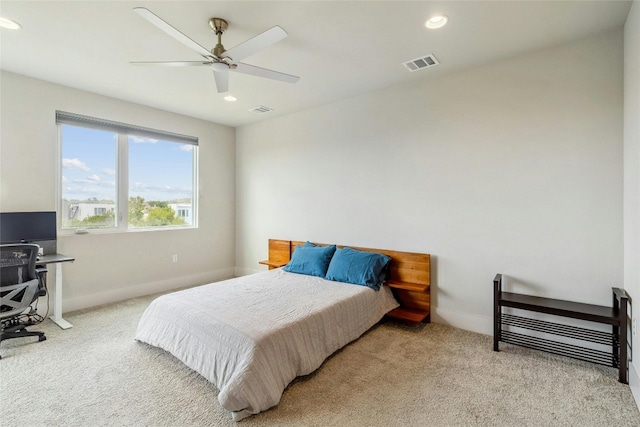 carpeted bedroom with ceiling fan