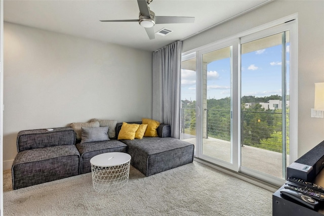 living room featuring ceiling fan