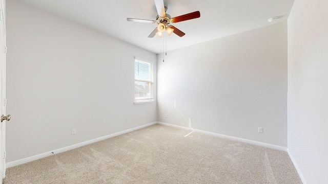 empty room with light carpet and ceiling fan