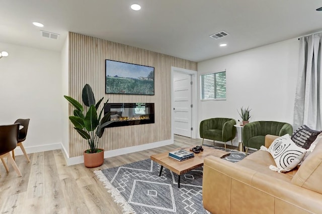 living room with light hardwood / wood-style floors