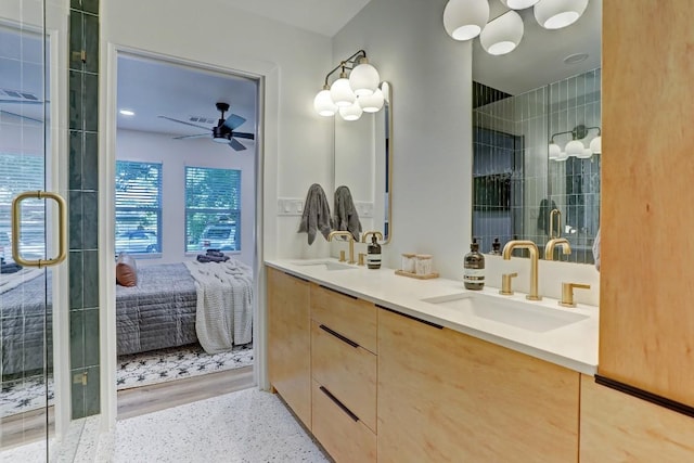 bathroom featuring vanity and ceiling fan