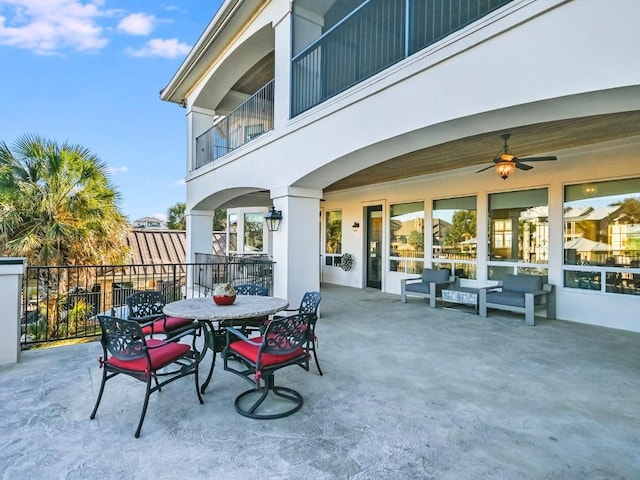 view of patio featuring ceiling fan