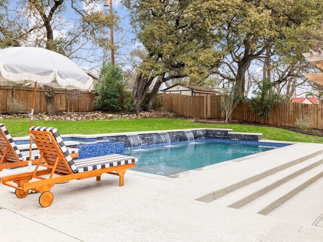 view of pool with a fenced in pool, a fenced backyard, a patio, and a lawn