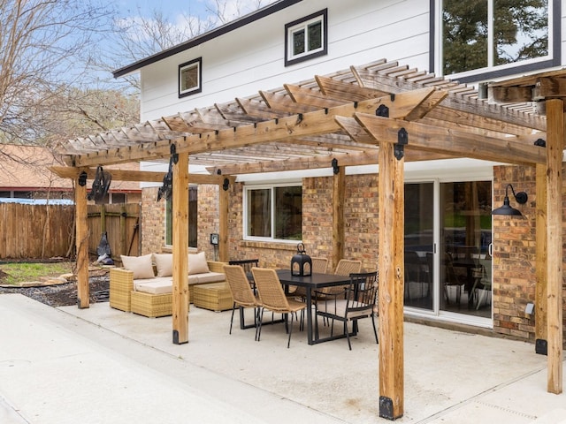 view of patio with outdoor lounge area and a pergola