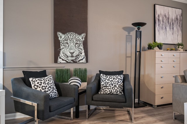 living area featuring hardwood / wood-style floors