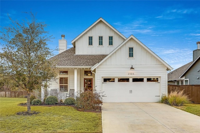 2104 Ringstaff Rd, Leander, TX 78641 - view of front of house featuring board and batten siding, concrete driveway, covered porch, roof with shingles, and a chimney