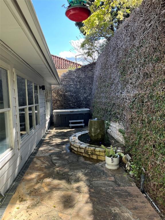 view of patio featuring a hot tub