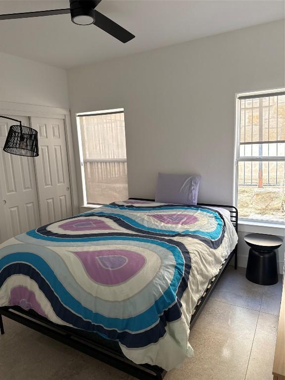 bedroom with a closet and ceiling fan