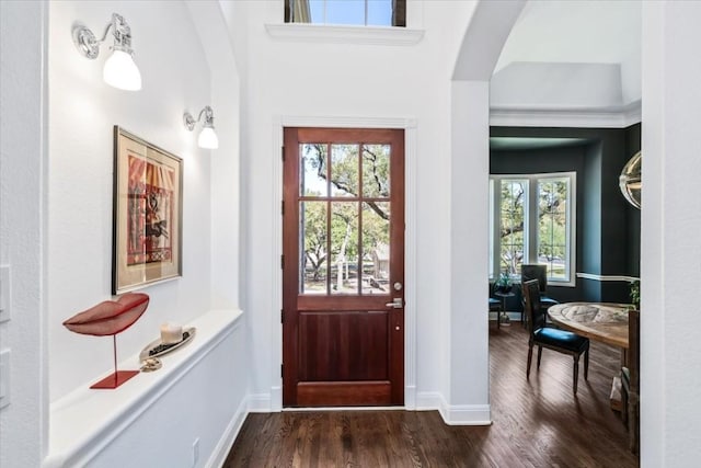 doorway to outside with dark hardwood / wood-style floors