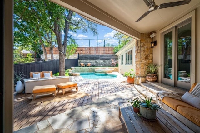 view of patio / terrace featuring a fenced in pool, outdoor lounge area, and ceiling fan