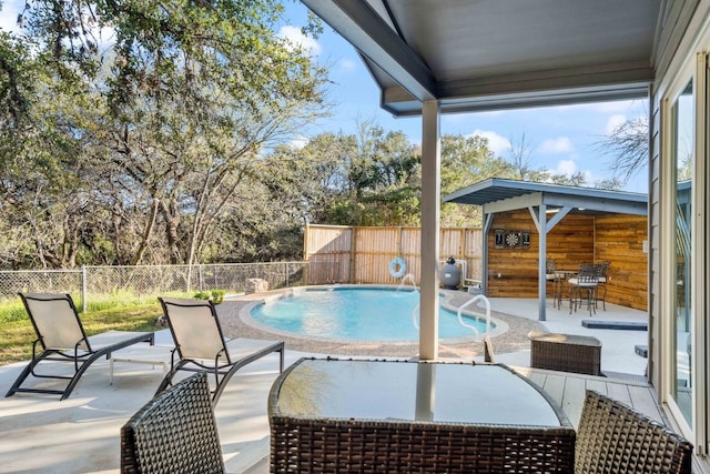 view of pool with a patio