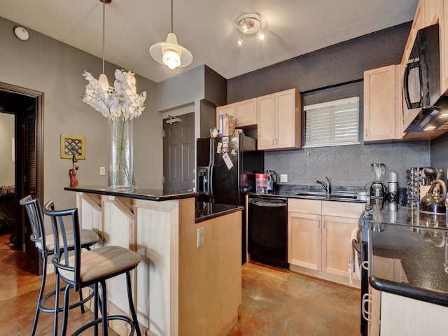 kitchen with a kitchen island, a breakfast bar, pendant lighting, black appliances, and light brown cabinets